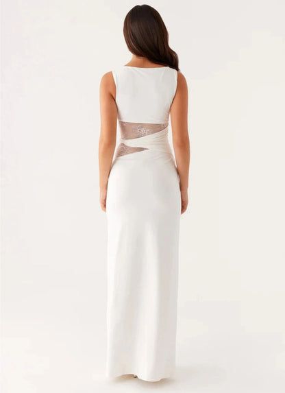 Grace | Elegant long dress with subtle cutouts